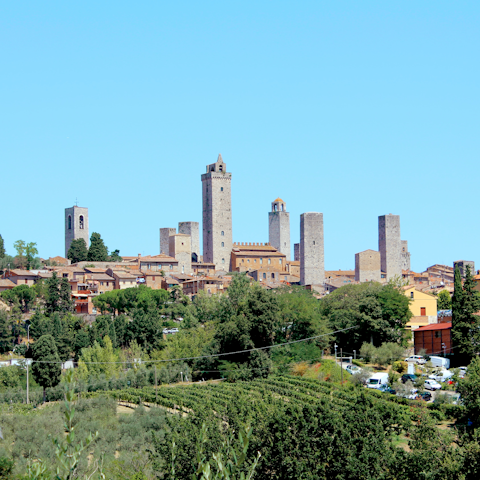 Discover the historic charms of San Gimignano – it's a sixteen-minute drive