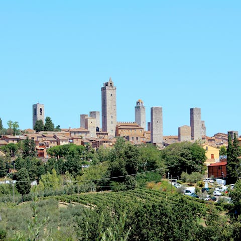Discover the historic charms of San Gimignano – it's a sixteen-minute drive