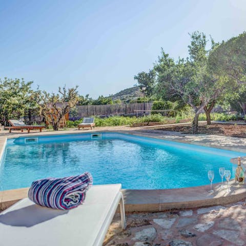 Cool off in the home's private pool