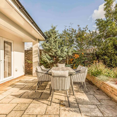 Tuck into breakfast alfresco-style on the patio