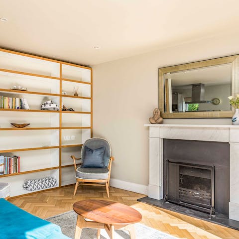 Curl up with a glass of wine by the fireplace