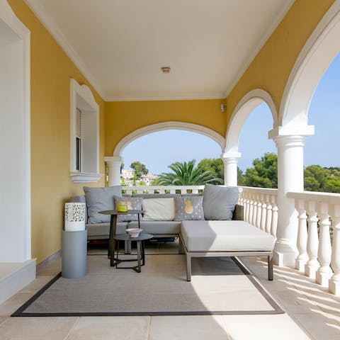 Bask in the sunshine on the terrace – the outdoor sofa is the perfect spot to savour your morning coffee