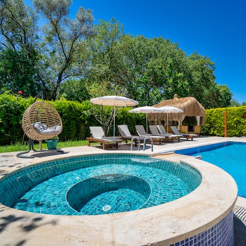 Choose between a soak in the Jacuzzi or a cooling dip in the pool