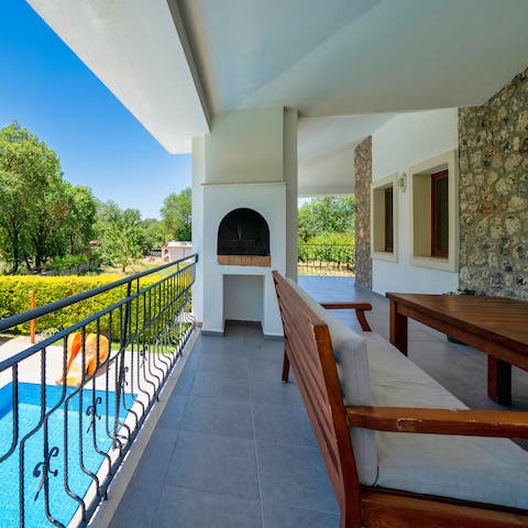 Light the stone oven on the first floor, or ground floor, for an alfresco dinner