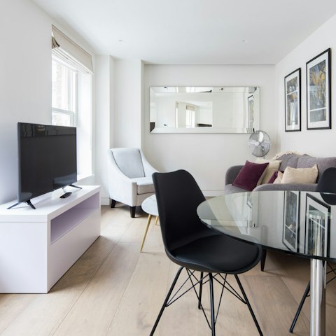 Relax after a day of retail therapy in the light-filled living room