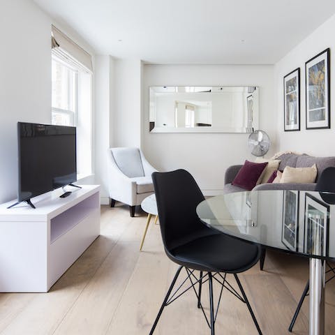 Relax after a day of retail therapy in the light-filled living room