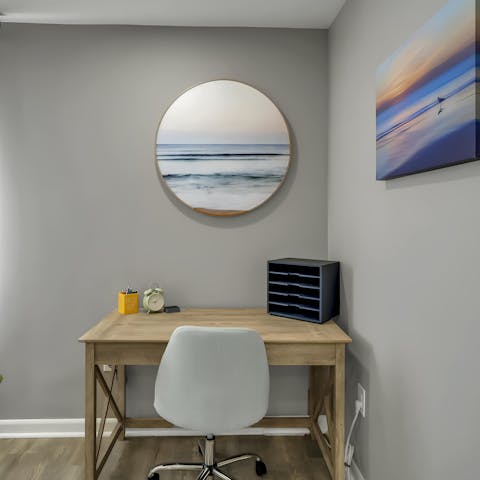 Catch up on work in the quiet desk corner