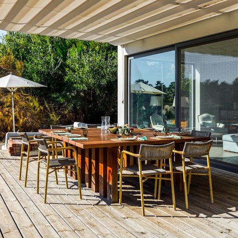 Sip an aperitif on the terrace before dining at one of the nearby restaurants