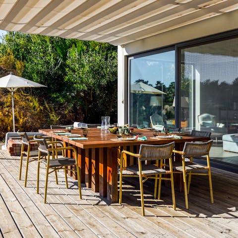 Sip an aperitif on the terrace before dining at one of the nearby restaurants