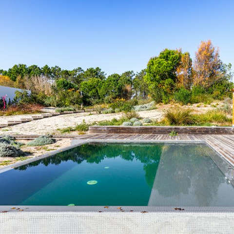 Take a dip in the private pool overlooking the garden