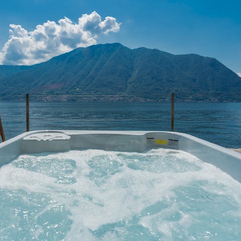 Unwind in the hot tub at sunset with a glass (or two) of Prosecco