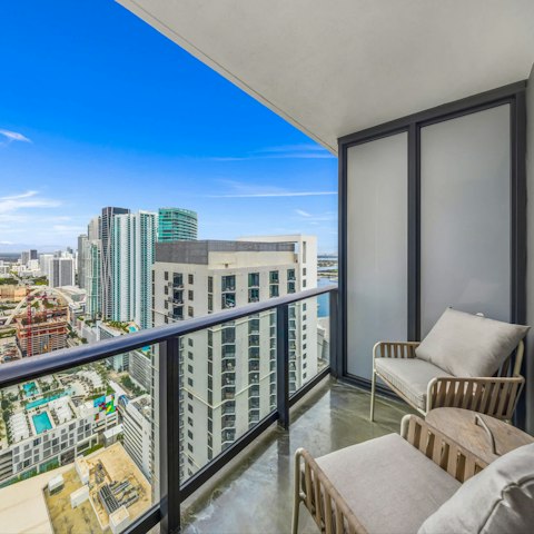Step out onto the balcony above the Miami skyline