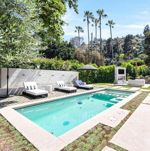 Spend blissful afternoons stretched out by the pool