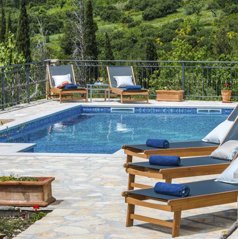 Cool off in the pool and dry off in the sun on a lounger