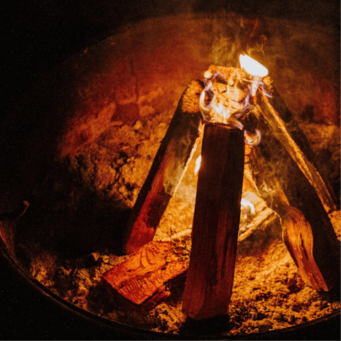 Catch a shooting star from beside the firepit in the shared courtyard