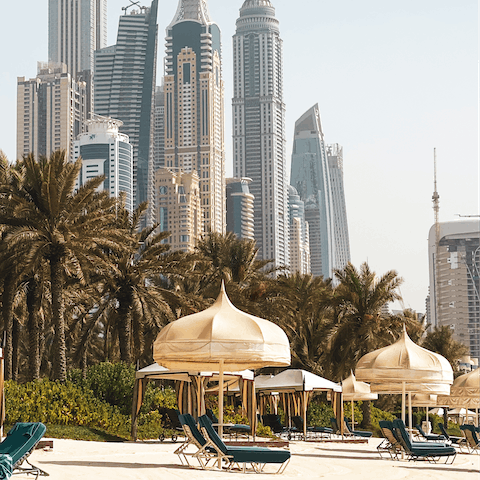 Head to the golden sands of La Mer beach