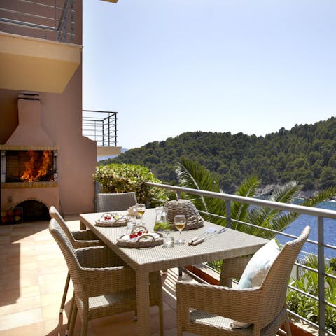 Devour your flame-grilled plateful in the sea-breeze