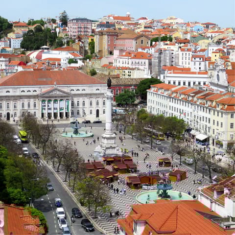 Have a stroll around Rossio Square, a four-minute walk away