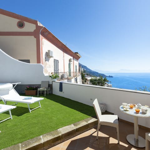 Enjoy alfresco meals and work on your tan on the terrace with breathtaking sea and mountain views before you