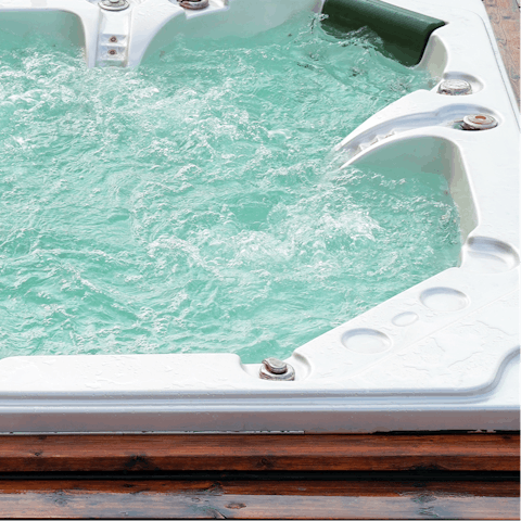 Enjoy a relaxing soak in your private outdoor hot tub