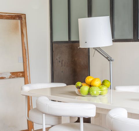 The white dining chair and table ensemble