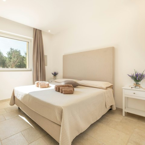 Unwind for the night in one of the calming bedrooms