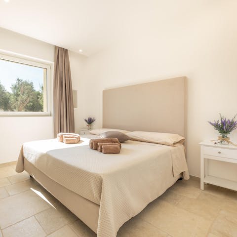Unwind for the night in one of the calming bedrooms