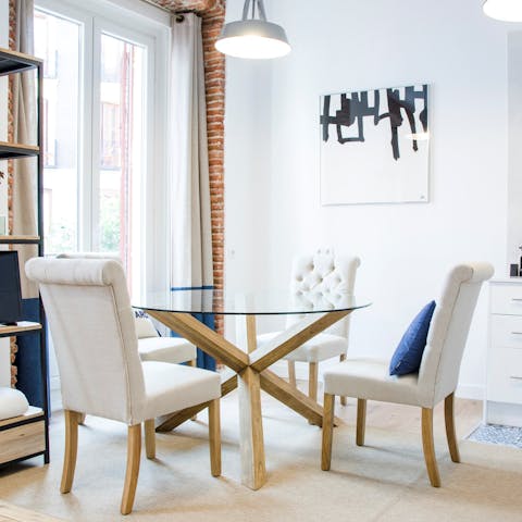 Gather together for an at-home tapas feast at the elegant dining table
