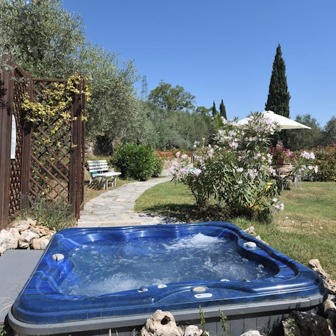 Unwind with a scenic soak in the hot tub