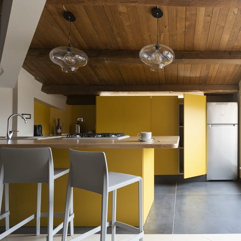 Drink your morning coffee in the stylish kitchen
