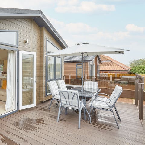 Spend sunny afternoons relaxing out on your private deck