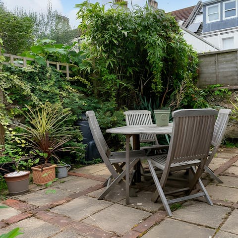 Sip drinks or dine alfresco in the leafy garden