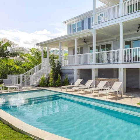 Relax by the pool in the sunshine