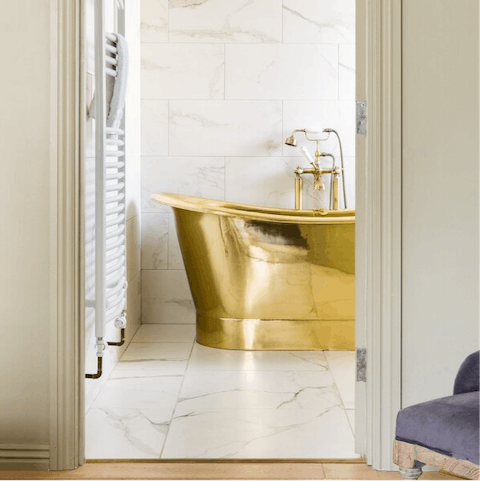 Bathe like royalty in the luxury brass bath