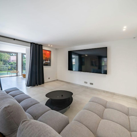 Relax with a movie night in the cinema room