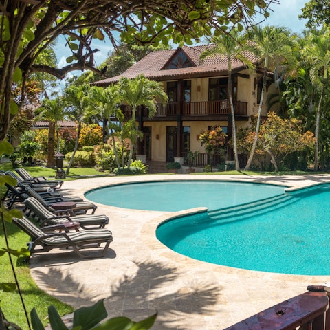 Soak up the sun beside the private pool and hot tub