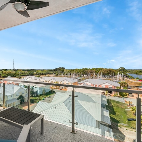 Admire the view of the marina from your private balcony