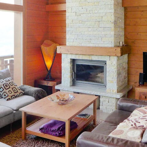 Warm up by the feature brick fireplace
