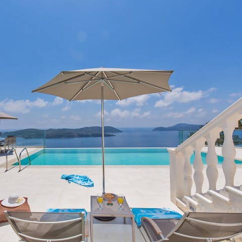 Grab a book and a refreshing drink the lie back on a sun lounger