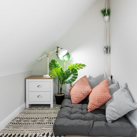 Curl up with a good book in this cosy hidden corner