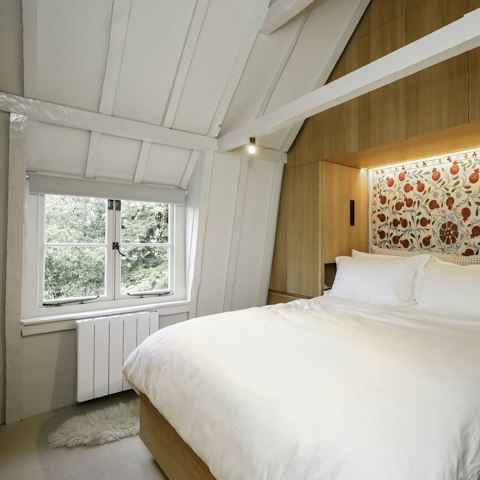 Admire original 18th-century features in the bedroom