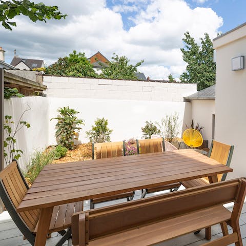 Relax and share delicious family meals in the outdoor dining area