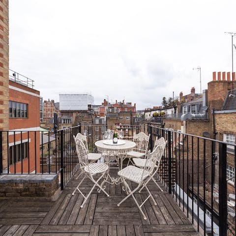 Enjoy a celebratory sundowner on the private terrace with its views over Central London's rooftops