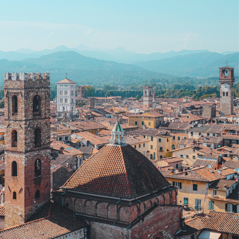 Explore the medieval walled city of Lucca, with the Guinigi Tower under a minute from home