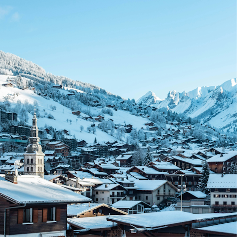 Take the shuttle to La Clusaz and explore the village