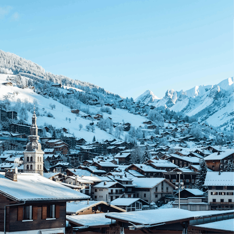 Take the shuttle to La Clusaz and explore the village