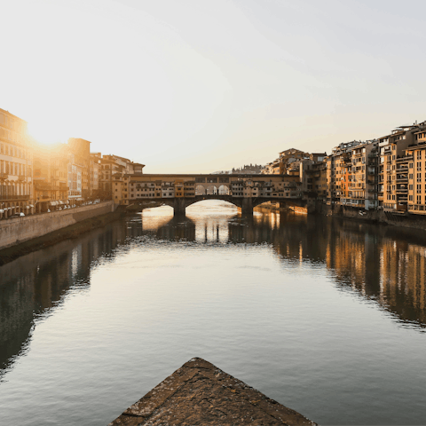 Begin your adventure in Florence with a stroll to Ponte Vecchio
