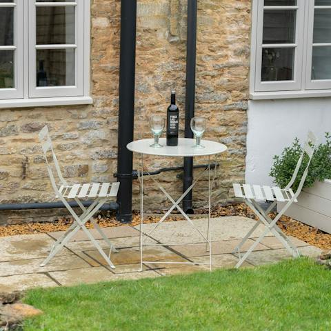 Enjoy an evening tipple to the sound of birdsong in the private garden