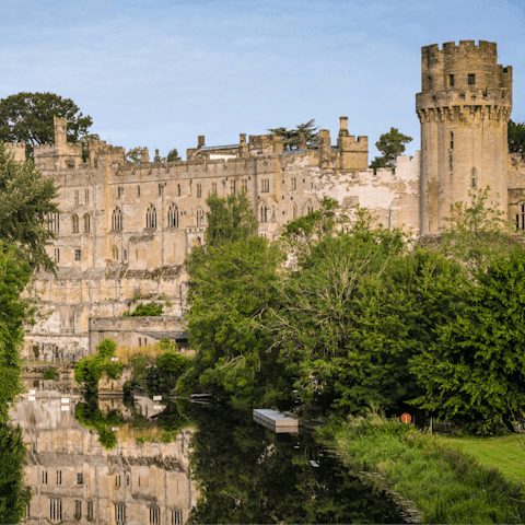 Spend a day at Warwick Castle, less than a 30-minute drive away
