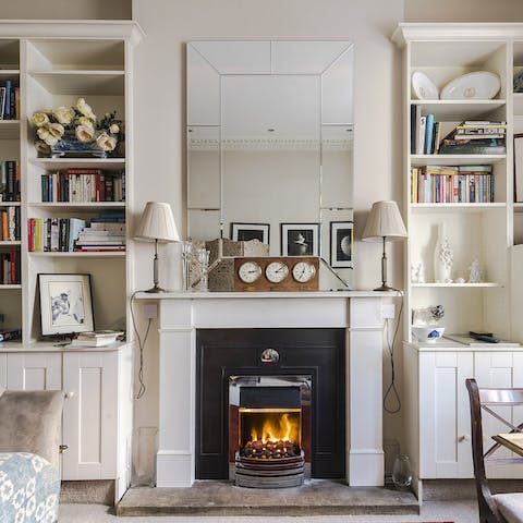 Get cosy by the fireplace